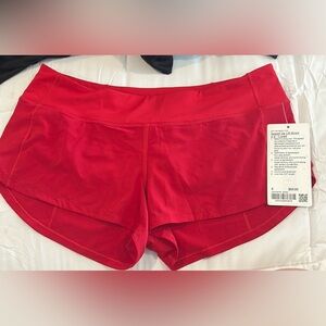 Lululemon Athletica Red Athletic Shorts with Curved Hem